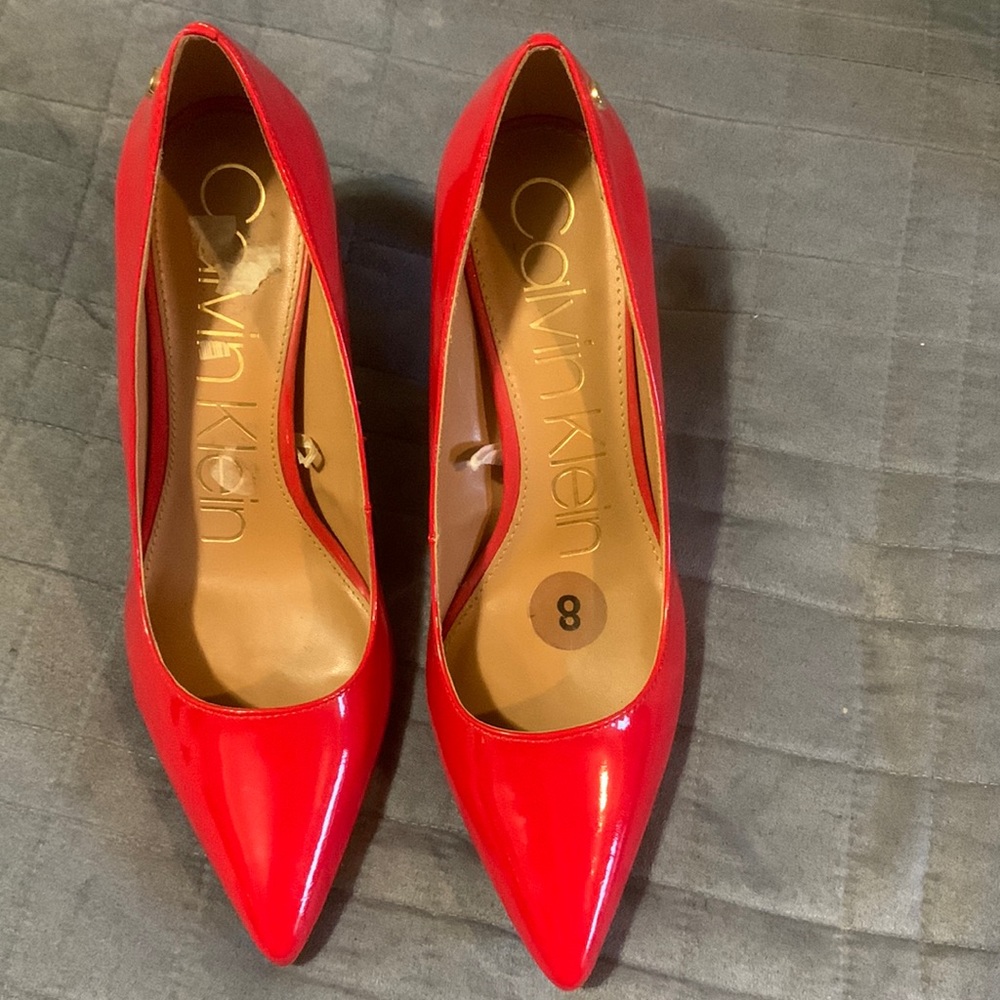 Calvin Klein red heels.